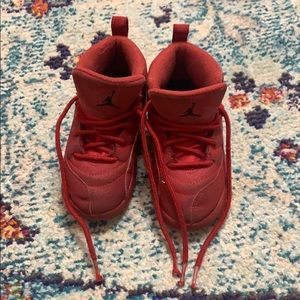 All red Jordan 12s